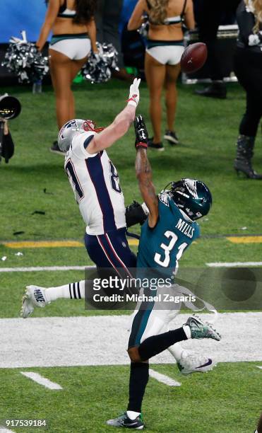 Jalen Mills of the Philadelphia Eagles breaks up a pass to Rob Gronkowski of the New England Patriots in Super Bowl LII at U.S. Bank Stadium on...