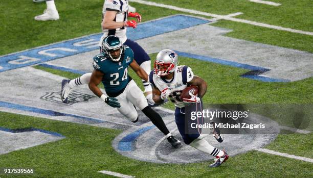 James White of the New England Patriots rushes to the end zone for a 26-yard touchdown during the game against the Philadelphia Eagles in Super Bowl...