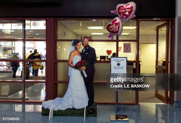 The Clark County Clerk's Office operates a temporary pop-up marriage license office at McCarran International Airport in Las Vegas on February 12,...