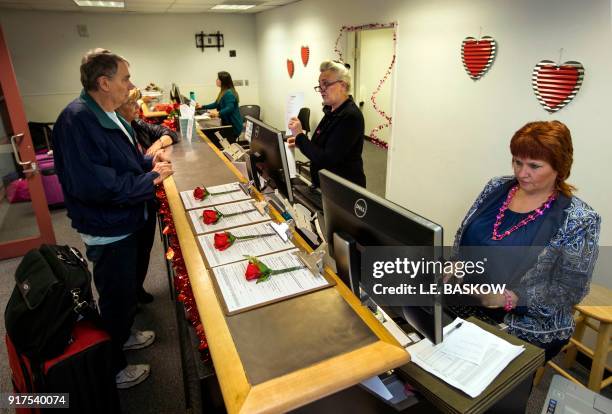 The Clark County Clerk's Office operates a temporary pop-up marriage license office at McCarran International Airport in Las Vegas on February 12,...