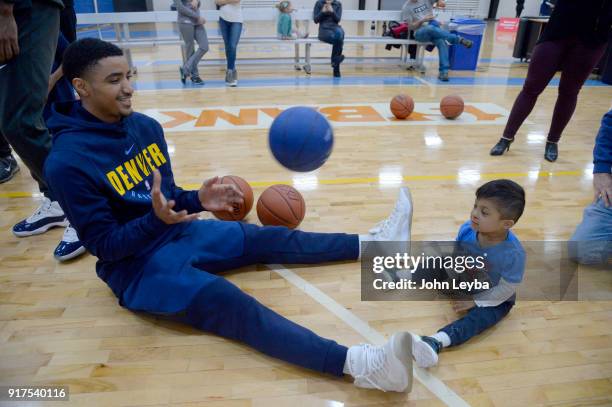 Denver Nuggets guard Gary Harris passes the ball with Weston Mitchell during the annual Basketball Skills Clinic was sponsored by Comfort Dental. The...