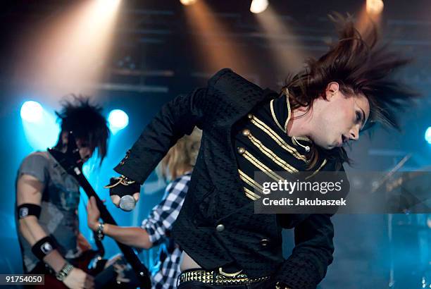 Guitarist Yu, bassist Kiro and singer Strify of the German rock band Cinema Bizarre perform live during a concert at the Postbahnhof on October 11,...