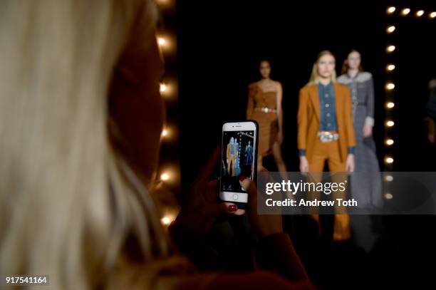 Models pose on the runway for the Veronica Beard Fall 2018 presentation at Highline Stages on February 12, 2018 in New York City.