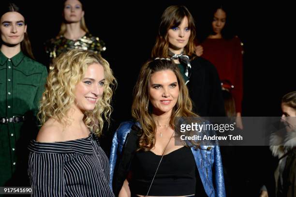 Designers Veronica Swanson Beard and Veronica Miele Beard pose with models at the runway for the Veronica Beard Fall 2018 presentation at Highline...