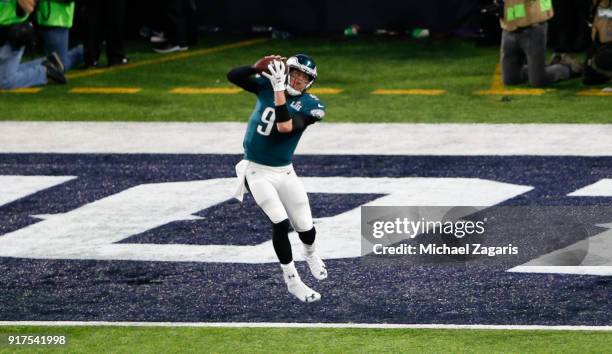 Nick Foles of the Philadelphia Eagles catches a one-yard touchdown pass during the game against the New England Patriots in Super Bowl LII at U.S....