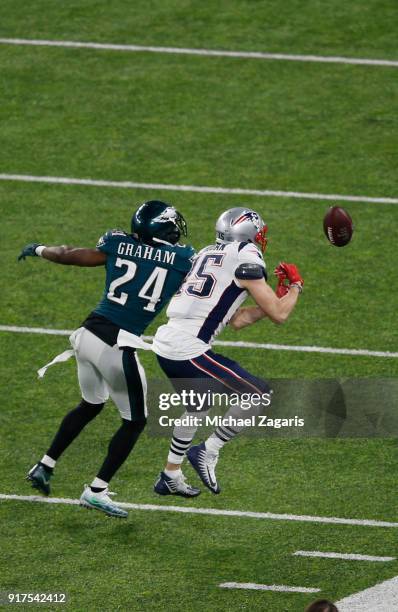 Stephon Gilmore of the Philadelphia Eagles breaks up a pass to Chris Hogan of the New England Patriots in Super Bowl LII at U.S. Bank Stadium on...