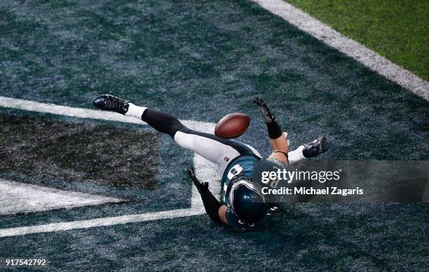 Zach Ertz of the Philadelphia Eagles juggles the ball in the end zone for an 11-yard touchdown during the game against the New England Patriots in...