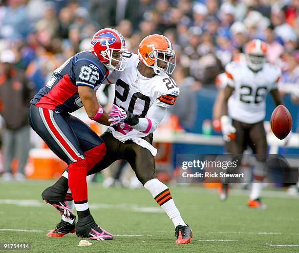 Mike Adams of the Cleveland Browns defends on Josh Reed of the Buffalo Bills as the ball falls short at Ralph Wilson Stadium on October 11, 2009 in...