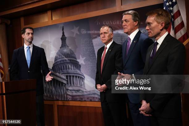 Sens. Tom Cotton , Thom Tillis , David Perdue and James Lankford listen during a news conference on immigration February 12, 2018 at the Capitol in...