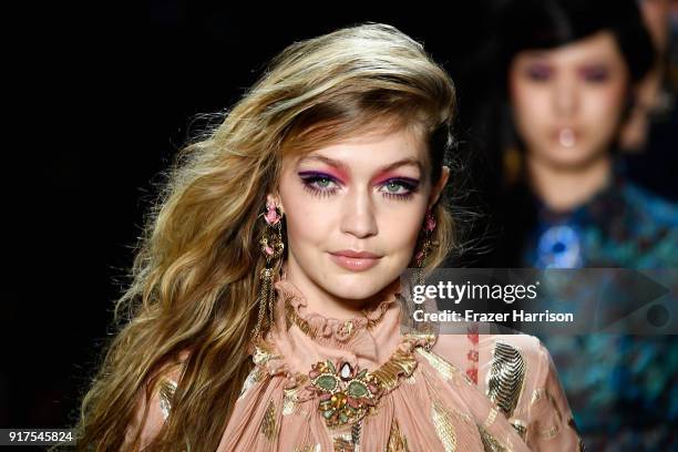 Model Gigi Hadid walks the runway for Anna Sui during New York Fashion Week: The Shows at Gallery I at Spring Studios on February 12, 2018 in New...