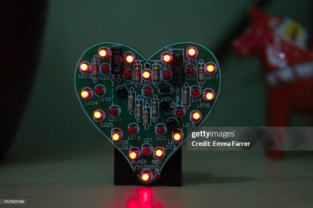 Heart made of LEDs on shelf