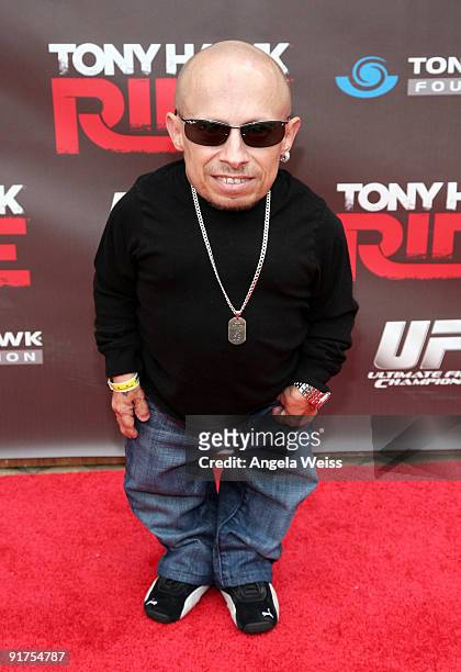 Actor Verne Troyer arrives to the 'Tony Hawk: Ride Presents Stand Up For Skateparks' Benefit held at the Green Acres Estate on October 11, 2009 in...
