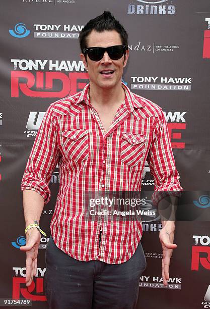 Actor Johnny Knoxville arrives to the 'Tony Hawk: Ride Presents Stand Up For Skateparks' benefit press conference held at the Green Acres Estate on...