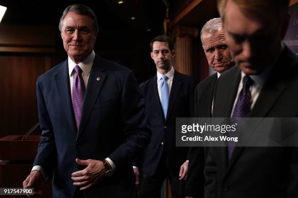 Sens. David Perdue , Tom Cotton , Thom Tillis and James Lankford leave after a news conference on immigration February 12, 2018 at the Capitol in...