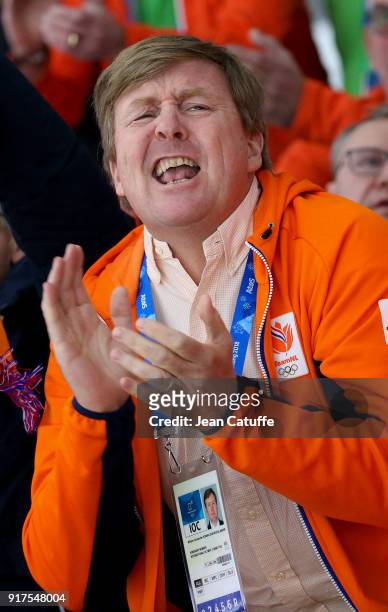 King Willem-Alexander of the Netherlands celebrates the gold medal of Ireen Wust and the bronze medal of Marrit Leenstra in the Speed Skating Ladies'...