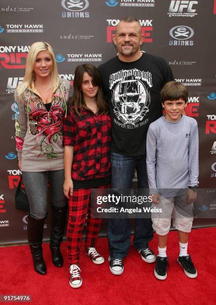 Kayla Beckster, Trista Liddell, UFC Fighter Chuck Liddell and Cade Liddell arrive to the 'Tony Hawk: Ride Presents Stand Up For Skateparks' Benefit...