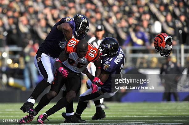 Chad Ochocinco of the Cincinnati Bengals loses his helmet after an interference call against the Baltimore Ravens at M&T Bank Stadium on October 11,...