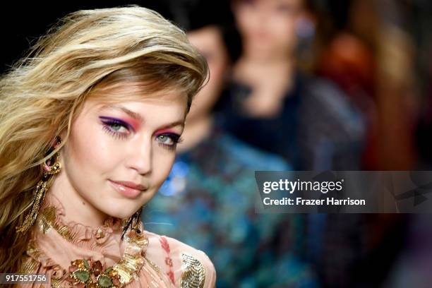 Model Gigi Hadid walks the runway for Anna Sui during New York Fashion Week: The Shows at Gallery I at Spring Studios on February 12, 2018 in New...