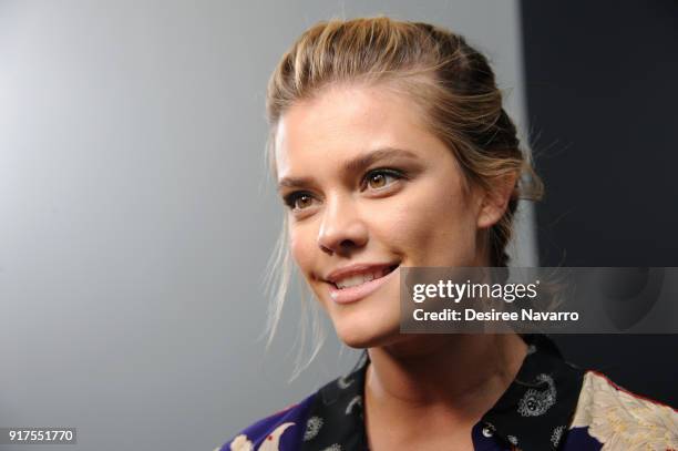 Nina Agdal poses backstage at the Zadig & Voltaire fashion show during New York Fashion Week at Cedar Lake Studios on February 12, 2018 in New York...