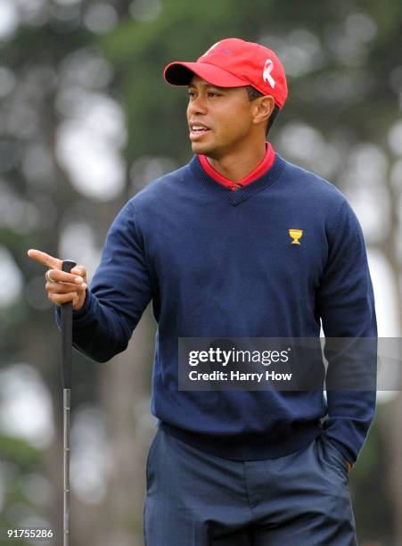 Tiger Woods of the USA Team reacts to his putt on the fourth hole during the Day Four Singles Matches of The Presidents Cup at Harding Park Golf...