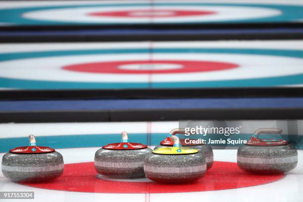 Curling stones sit on the ice during the Curling Mixed Doubles Bronze Medal Game between Olympic Athletes from Russia and Norway on day four of the...