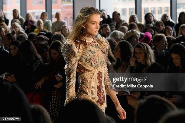 Model walks the runway at the Anna Sui runway show during IMG NYFW: The Shows at Spring Studios on February 12, 2018 in New York City.