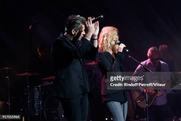 Benjamin Biolay and Sandrine Kiberlain perform during the Charity Gala against Alzheimer's disease at Salle Pleyel on February 12, 2018 in Paris,...