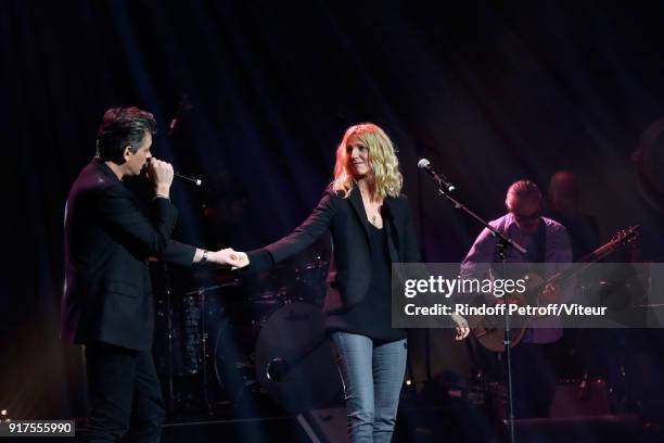 Benjamin Biolay and Sandrine Kiberlain perform during the Charity Gala against Alzheimer's disease at Salle Pleyel on February 12, 2018 in Paris,...