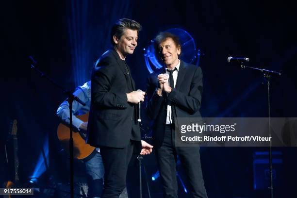 Benjamin Biolay and Alain Souchon perform during the Charity Gala against Alzheimer's disease at Salle Pleyel on February 12, 2018 in Paris, France.