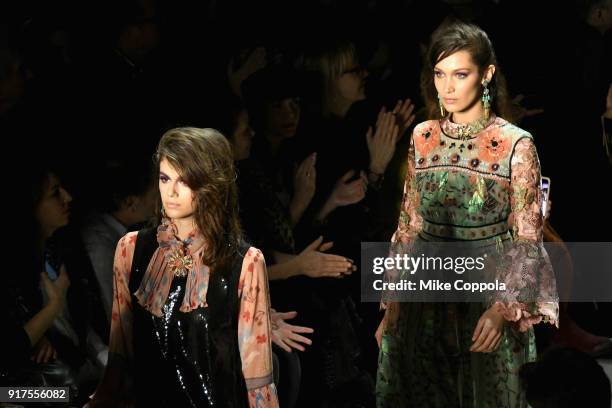 Models Kaia Gerber and Bella Hadid walks the runway at the Anna Sui runway show during IMG NYFW: The Shows at Spring Studios on February 12, 2018 in...