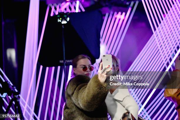 Guest visits the E! Lounge at IMG NYFW: The Shows during IMG NYFW: The Shows at Spring Studios on February 12, 2018 in New York City.