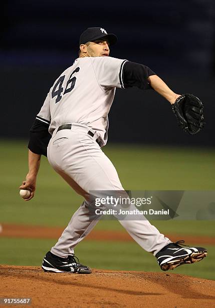 Andy Pettitte of the New York Yankees delivers the ball against the Minnesota Twins in Game Three of the ALDS during the 2009 MLB Playoffs at the...