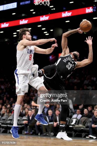 Allen Crabbe of the Brooklyn Nets takes a shot against Danilo Gallinari of the LA Clippers in the second quarter during their game at Barclays Center...