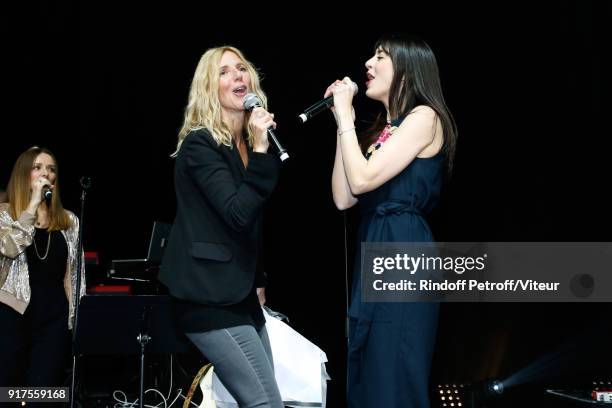 Sandrine Kiberlain and Nolwenn Leroy perform during the Charity Gala against Alzheimer's disease at Salle Pleyel on February 12, 2018 in Paris,...