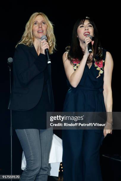 Sandrine Kiberlain and Nolwenn Leroy perform during the Charity Gala against Alzheimer's disease at Salle Pleyel on February 12, 2018 in Paris,...