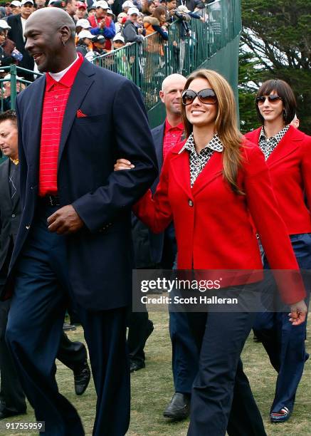 Michael Jordan of the USA Team walks with his girlfriend Yvette Prieto to the closing cermonies during the Final Round Singles Matches of The...