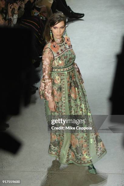 Model Bella Hadid walks the runway at the Anna Sui runway show during IMG NYFW: The Shows at Spring Studios on February 12, 2018 in New York City.