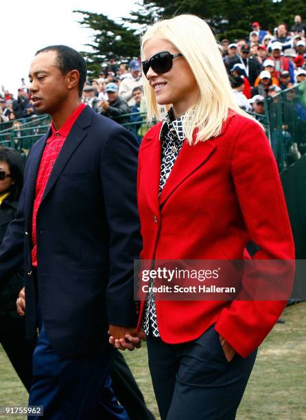 Tiger Woods of the USA Team walks with his wife Elin to the closing cermonies during the Final Round Singles Matches of The Presidents Cup at Harding...