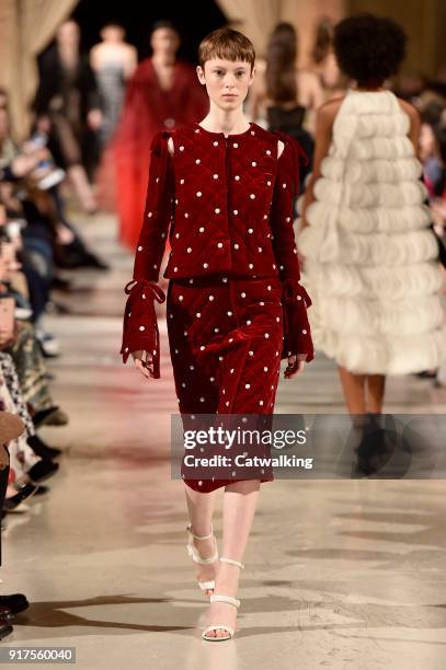 Model walks the runway at the Oscar de la Renta Autumn Winter 2018 fashion show during New York Fashion Week on February 12, 2018 in New York, United...