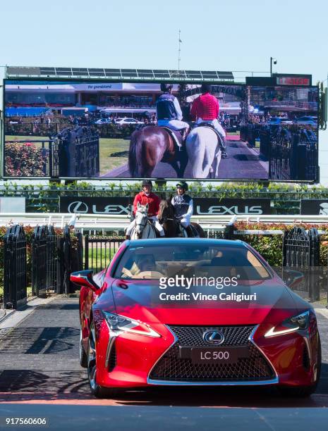 Francesca Cumani is seen riding alongside Kate Waterhouse driving the Lexus LC 500 during the VRC Melbourne Cup Sponsorship Announcement at...