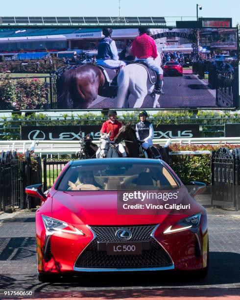 Francesca Cumani is seen riding alongside Kate Waterhouse driving the Lexus LC 500 during the VRC Melbourne Cup Sponsorship Announcement at...