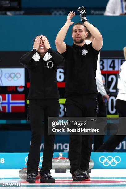 Anastasia Bryzgalova and Aleksandr Krushelnitckii of Olympic Athletes from Russia celebrate after defeating Norway to win the bronzel medal during...