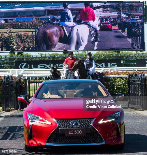 Francesca Cumani is seen riding alongside Kate Waterhouse driving the Lexus LC 500 during the VRC Melbourne Cup Sponsorship Announcement at...