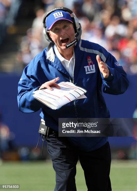 Head coach Tom Coughlin of the New York Giants reacts on the sidelines against the Oakland Raiders after their game on October 11, 2009 at Giants...