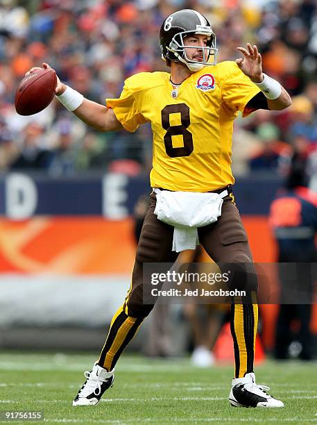 Kyle Orton of the Denver Broncos passes against the New England Patriots during an NFL game at Invesco Field at Mile High on October 11, 2009 in...