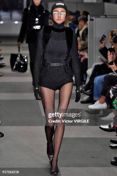 Model walks the runway at Alexander Wang Ready to Wear Fall/Winter 2018-2019 Fashion Show during New York Fashion Week on February 10, 2018 in New...