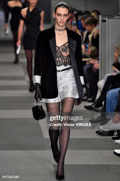 Model walks the runway at Alexander Wang Ready to Wear Fall/Winter 2018-2019 Fashion Show during New York Fashion Week on February 10, 2018 in New...