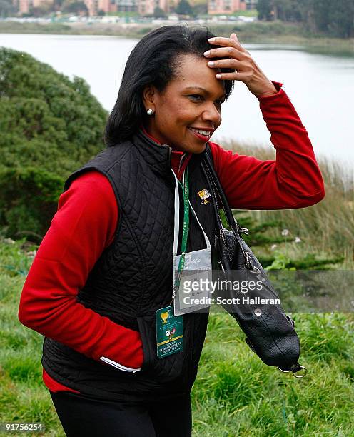 Condoleezza Rice watches the play on the 13th hole during the Final Round Singles Matches of The Presidents Cup at Harding Park Golf Course on...