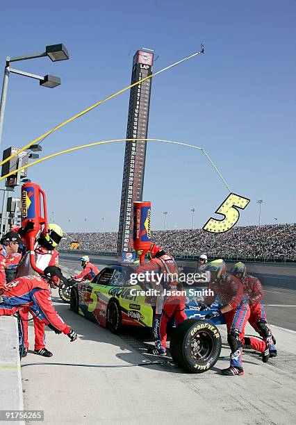 Mark Martin pits the Kellogg's/CARQUEST Chevrolet during the NASCAR Sprint Cup Series Pepsi 500 at Auto Club Speedway on October 11, 2009 in Fontana,...