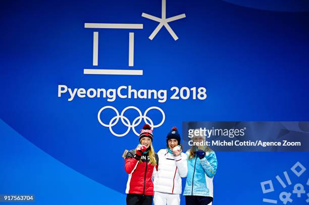 Justine Dufour-lapointe of Canada wins the silver medal, Perrine Laffont of France wins the gold medal, Yulia Galysheva of Kazakhstan wins the bronze...